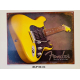 Plaque Métal décorative guitard jaune 40.5 x 32 cm